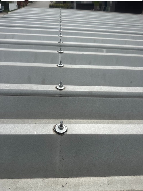 折板を再び戻して固定